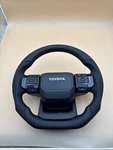 Toyota Land Cruiser / Hilux Steering Wheel Carbon LC250 (M-2-1031)(M-4-1031). Fixed Price $319.99.